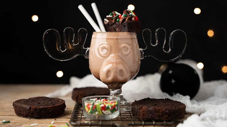 A festive chocolate milkshake with a moose on top, perfect for Christmas cocktails.
