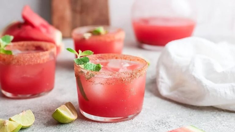 Refreshing watermelon margarita infused with zesty lime and aromatic mint, perfect for Valentine's Day cocktails.