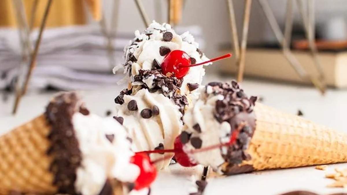 Round up a selection of shared, no bake desserts featuring ice cream cones adorned with chocolate chips and cherries.