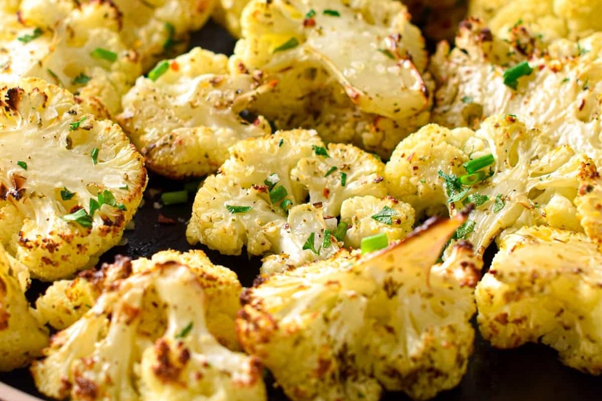 31 Guilt-Free Air Fryer Recipes for Every Meal 22 Cauliflower florets on a baking sheet.
