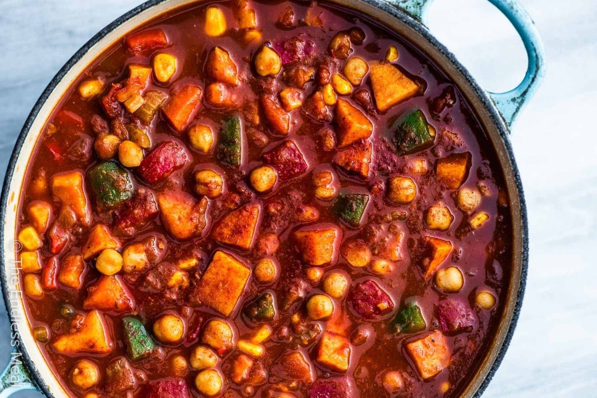 Creative Sweet Potato Recipes 14 A pot of stew with vegetables and chickpeas.