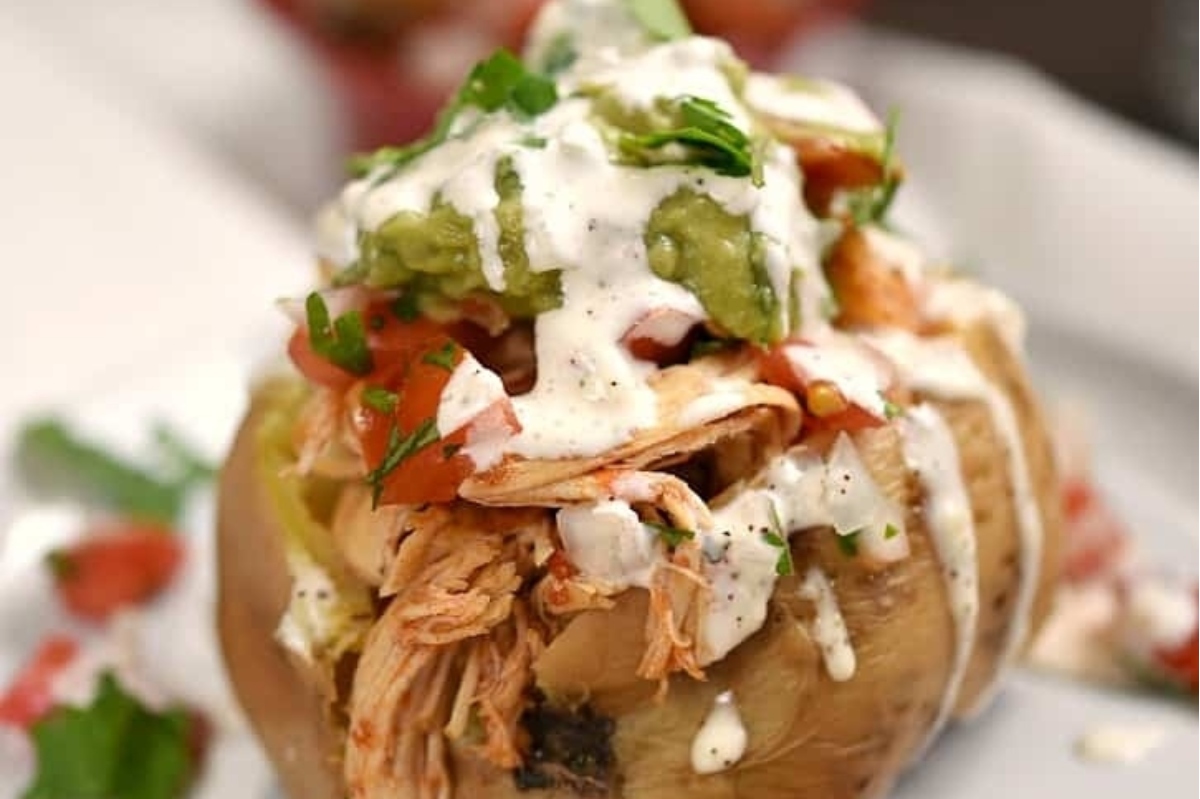 Creative Sweet Potato Recipes 23 Mexican baked potatoes with guacamole and sour cream.