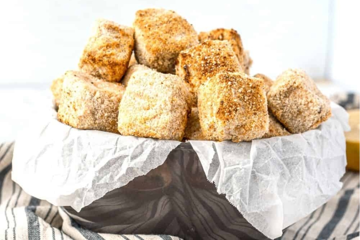 31 Guilt-Free Air Fryer Recipes for Every Meal 29 A bowl full of breaded chicken nuggets.