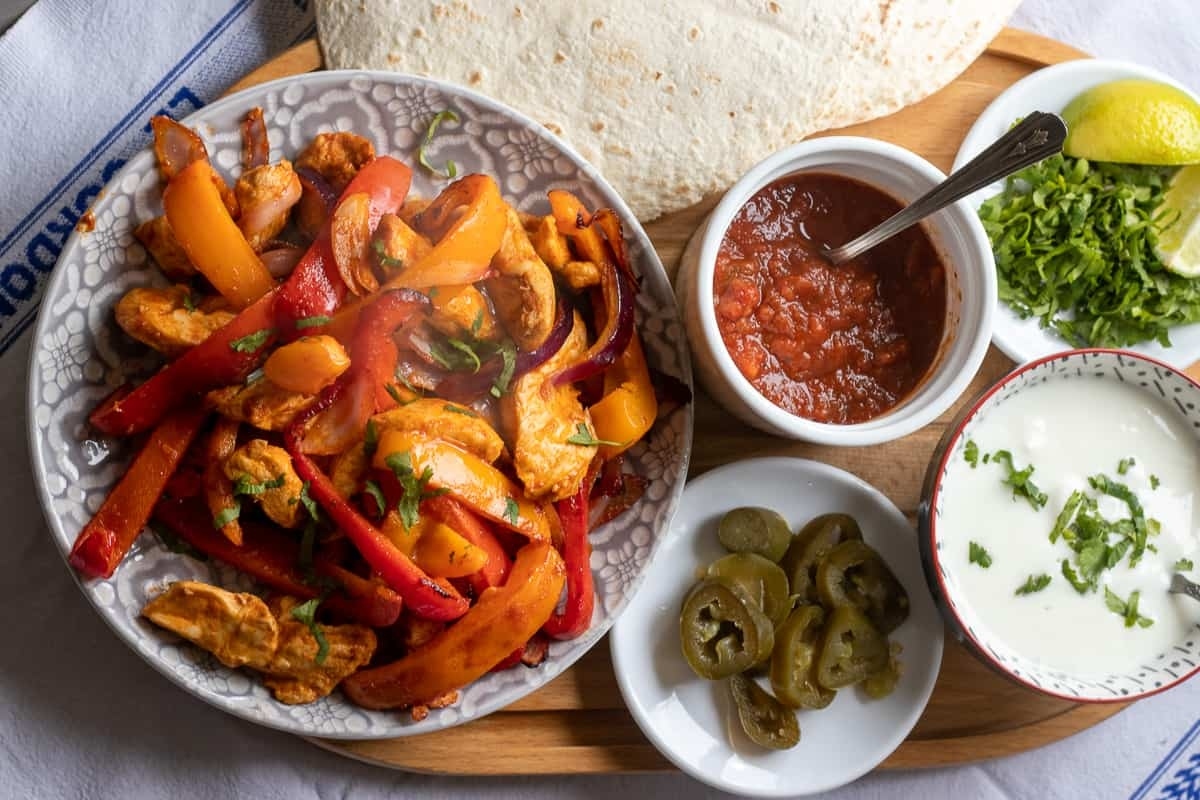 31 Guilt-Free Air Fryer Recipes for Every Meal 23 Chicken fajitas with guacamole and salsa.