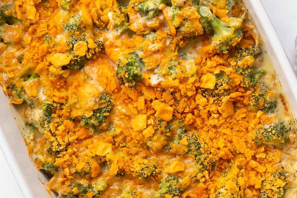 A casserole dish with broccoli and cheese.