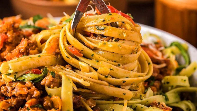 Pesto Fettuccini with Bolognese Sauce.