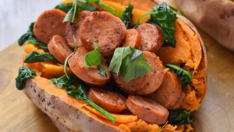 Stuffed sweet potatoes with sausage and spinach.
