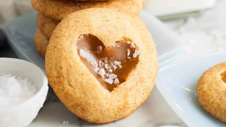 Heart shaped cookies with sea salt on a plate.