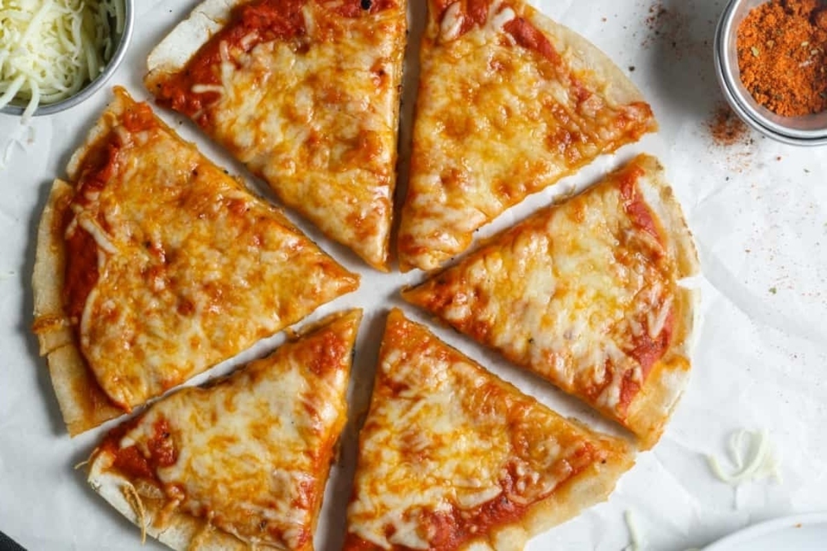 A pizza on a plate.