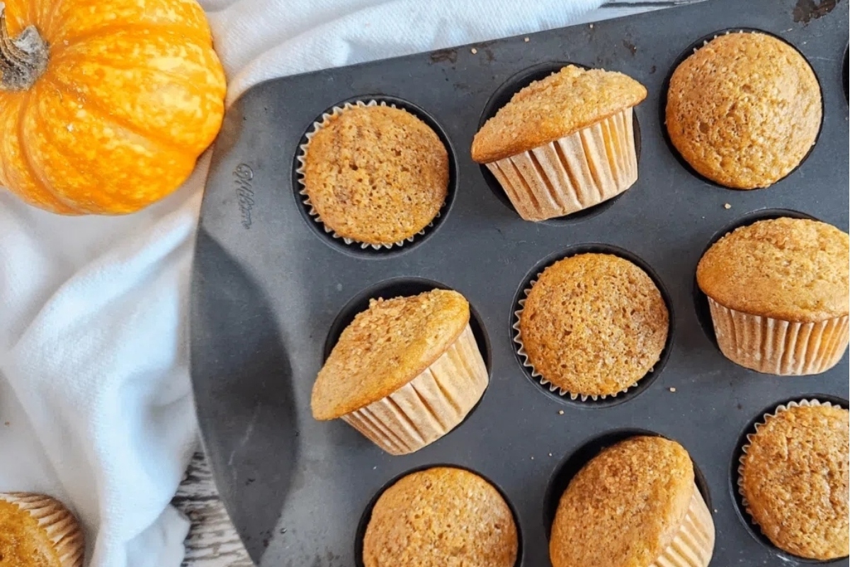 A muffin pan with muffins in it.
