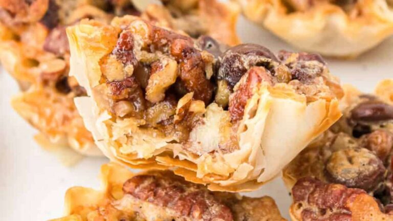 Mini Pecan Chocolate Pies recipe by On My Kids Plate.