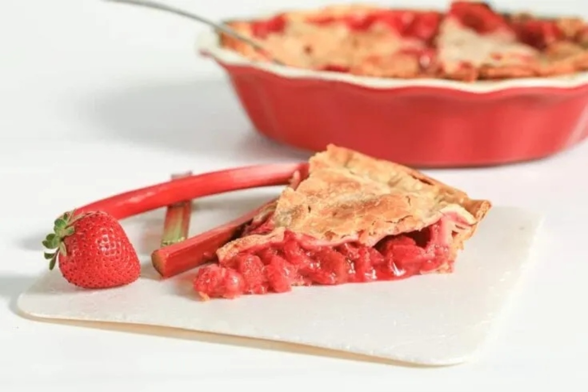 30 Nostalgic Old-Fashioned Desserts like Grandma Made 8 A slice of strawberry pie on a white plate.