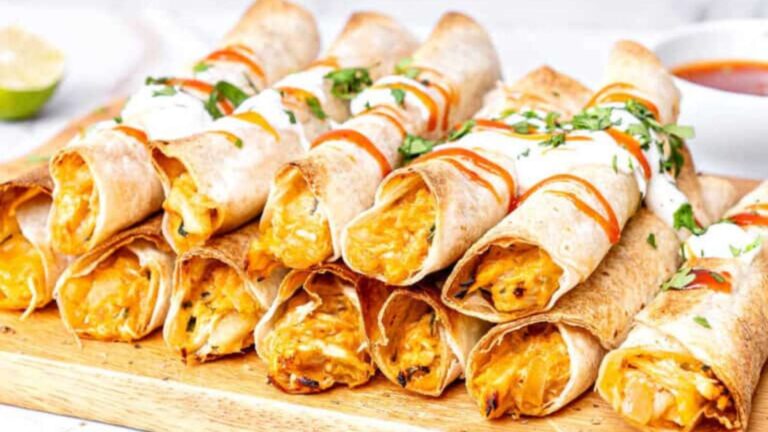 Baked Chicken Taquitos recipe by Vintage Kitchen Notes.