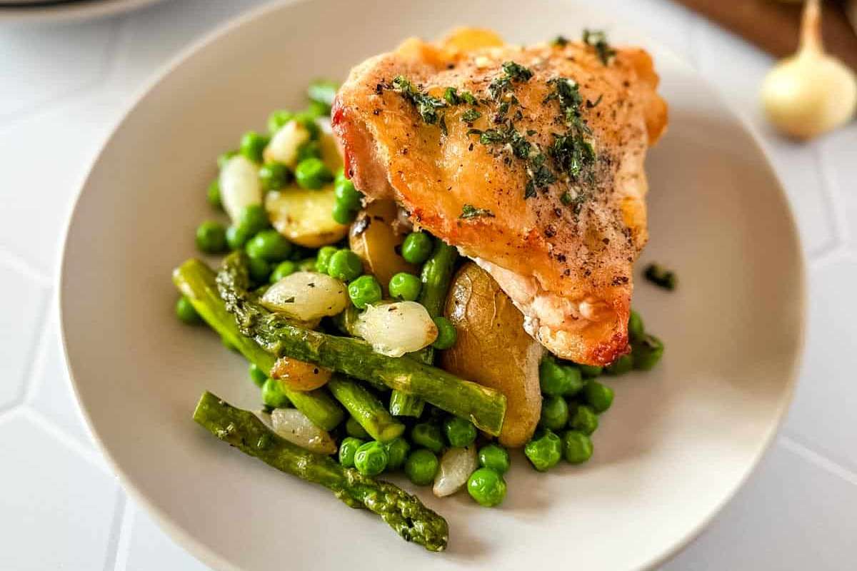 50 Spring Dinners You'll Make 100 Times 16 Easy Spring Sheet Pan Chicken with Asparagus and Peas