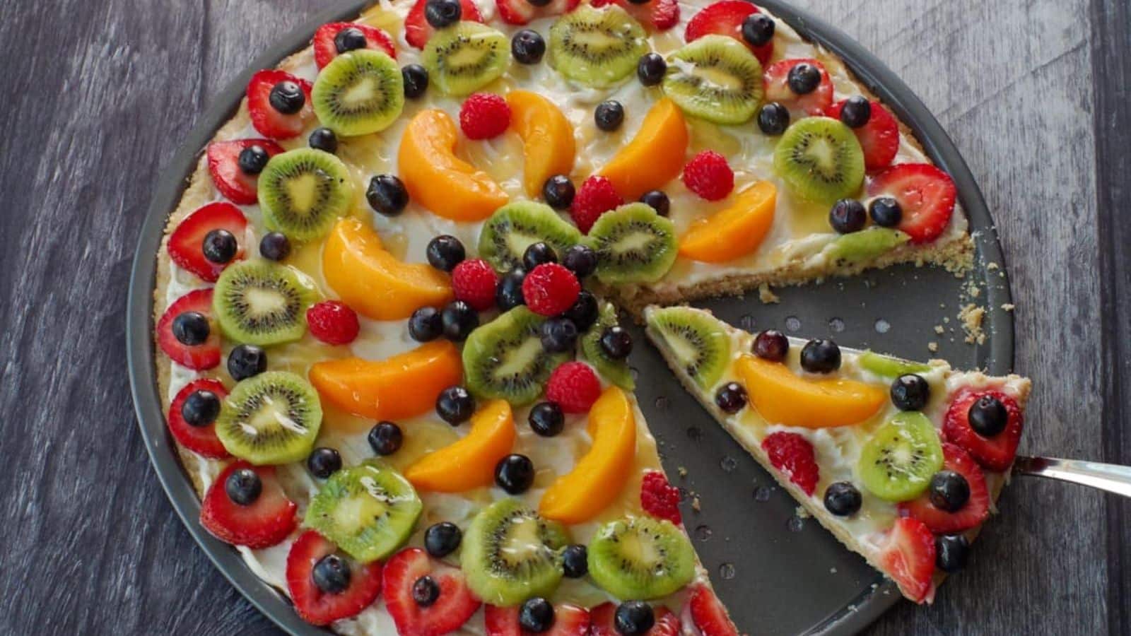 35 Desserts Perfect For Warm Day Fall Picnics 24 Fruit Pizza (With Glaze) recipe by Food Meanderings.