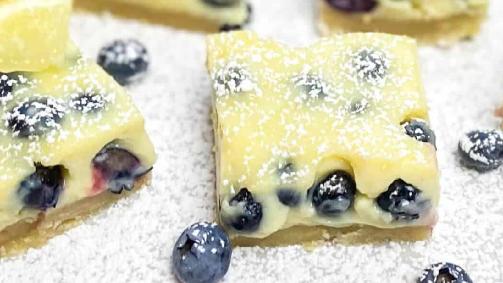 35 Desserts Perfect For Warm Day Fall Picnics 32 Lemon Blueberry Bars recipe by Maplewood Road.