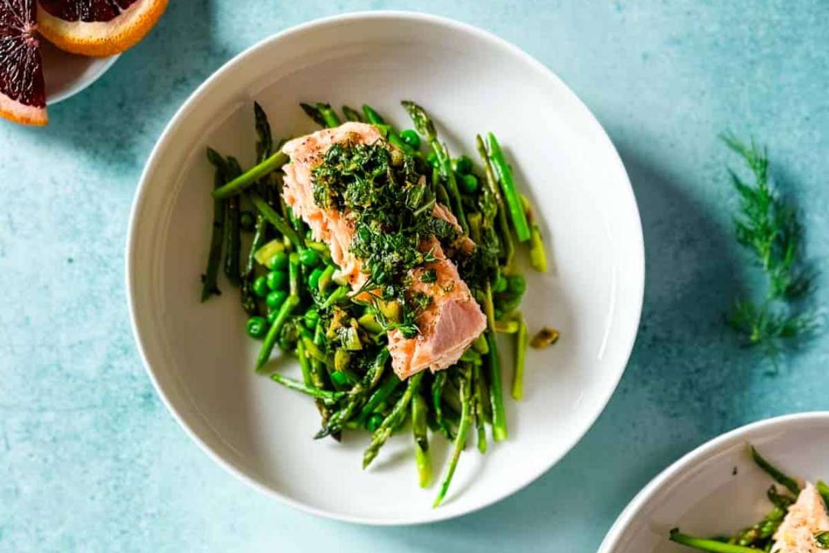 50 Spring Dinners You'll Make 100 Times 6 Slow Roasted Salmon with Spring Herb Sauce.