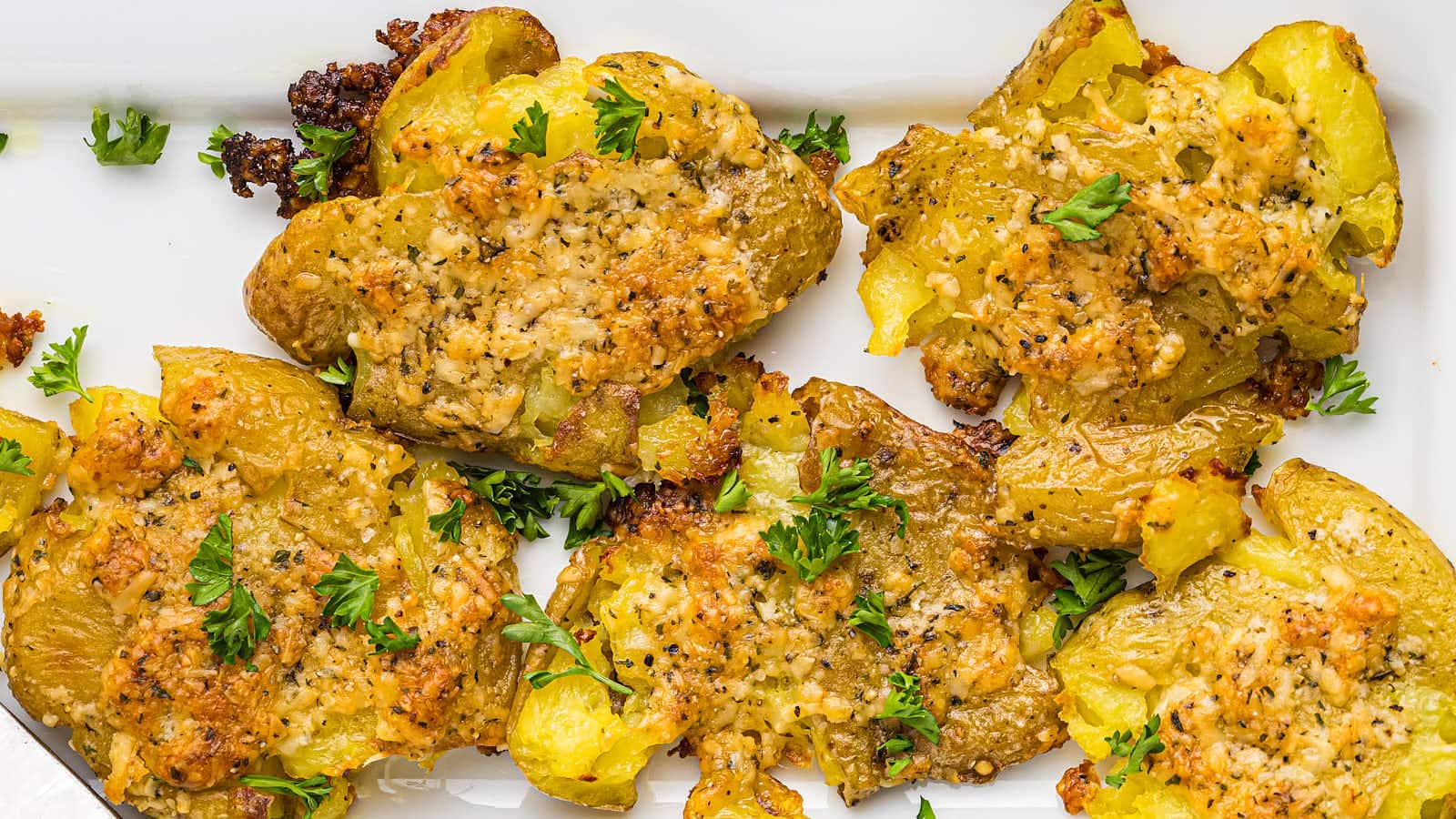 59 Easy Fall Side Dishes You’ll Make Again and Again 8 Parmesan Crusted Potatoes recipe by Cheerful Cook.