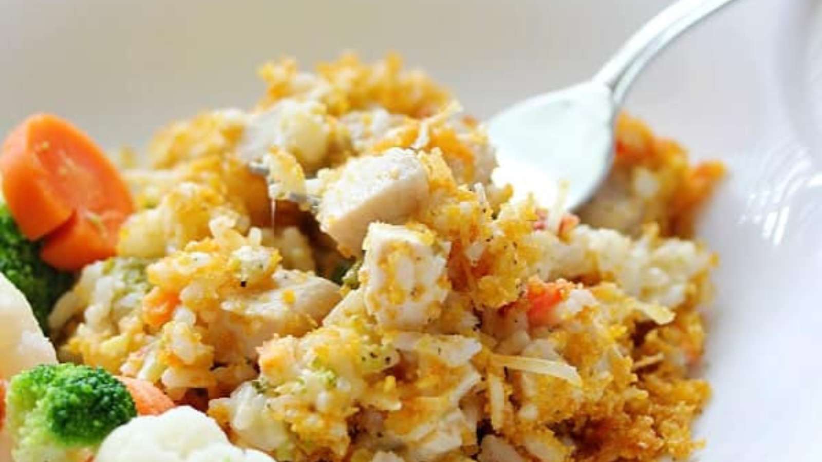 Creamy Chicken & Rice Casserole recipe by Simply Stacie.