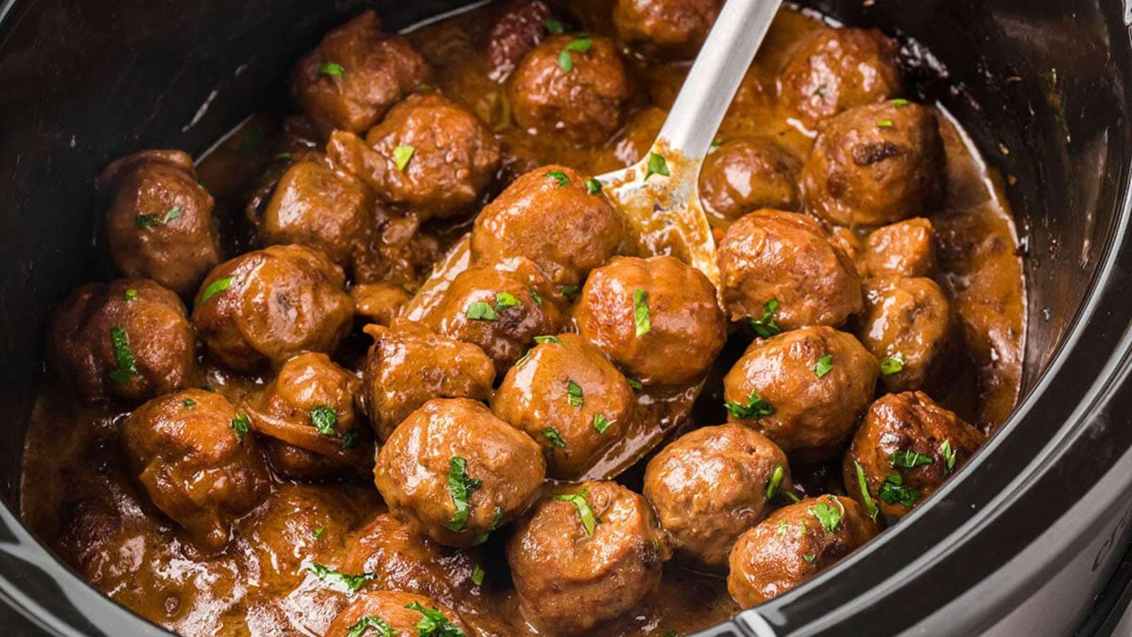 Slow Cooker Meatballs And Gravy recipe by Bowl Me Over.
