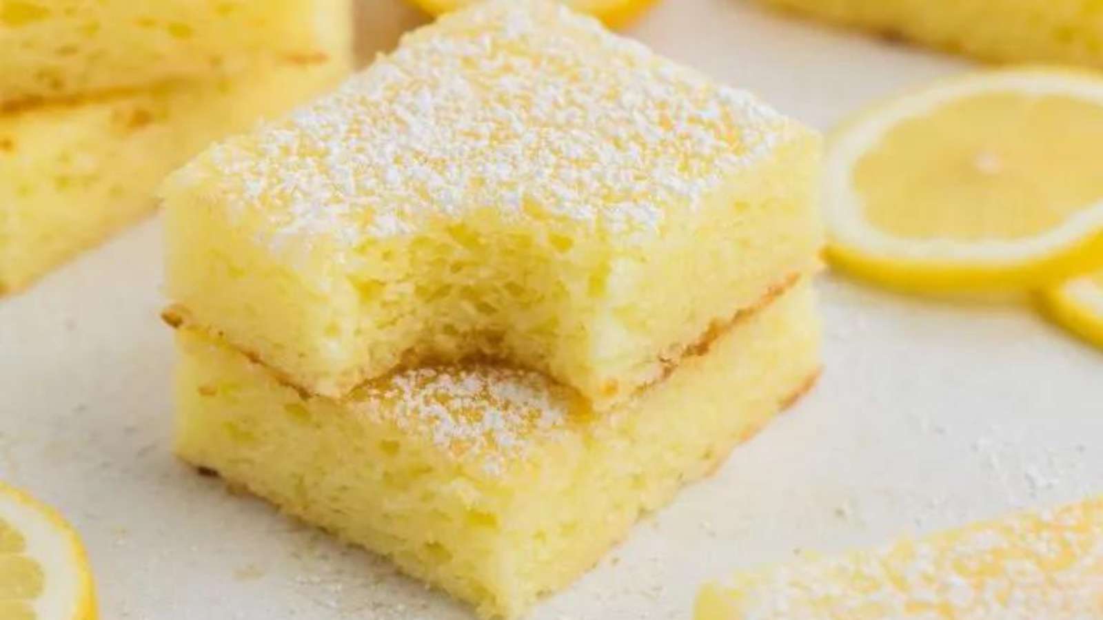 Two Ingredient Lemon Bars recipe by Semi Homemade Kitchen.