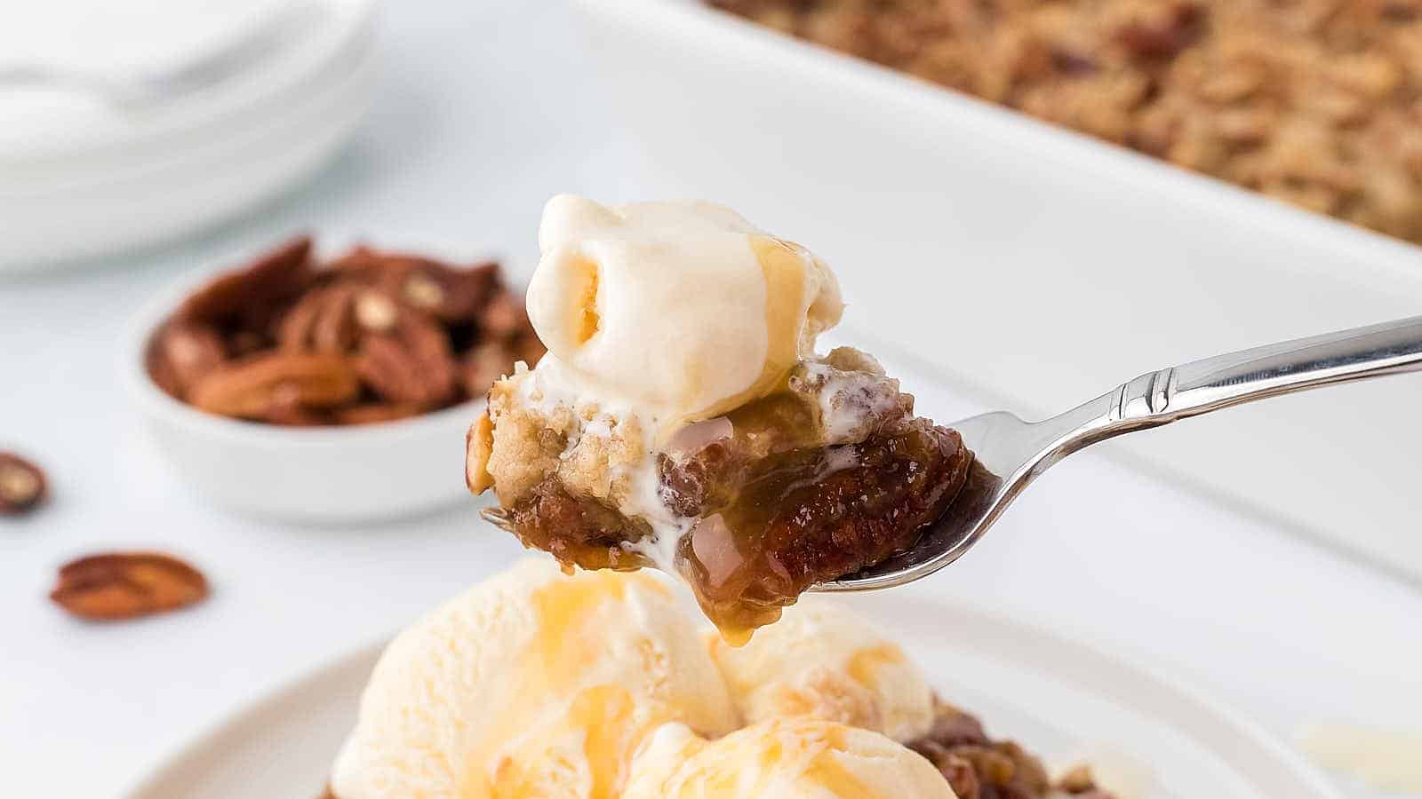 Pecan Pie Dump Cake recipe by Cheerful Cook.
