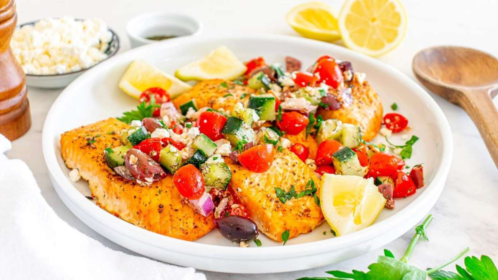 33 Easy Seafood Dinners That’ll Have You Skipping Takeout 14 Baked Salmon With Greek Salsa recipe by xoxoBella.