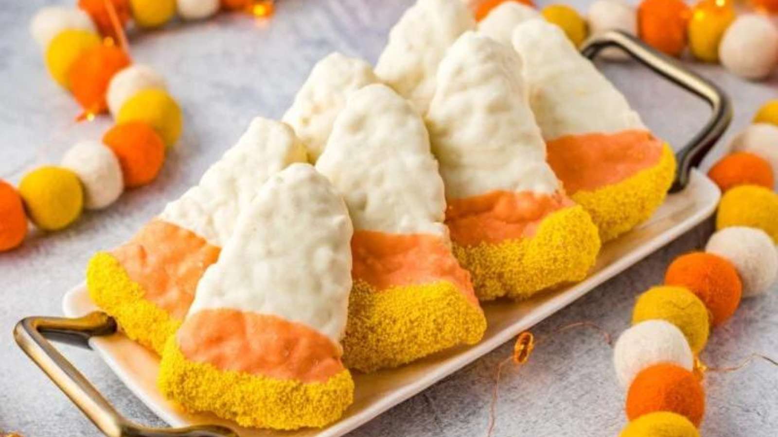 17 Candy Corn Desserts That Are Almost Too Cute to Eat 6 Halloween Rice Krispies Treats recipe by Kitchen Divas.