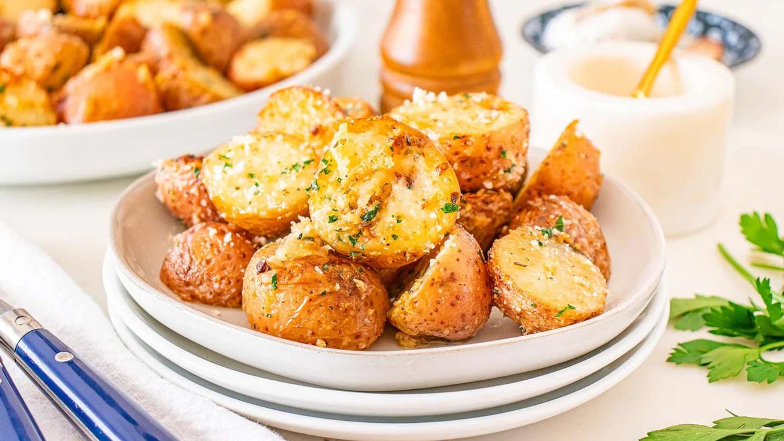 27 Easy Potato Sides Perfect for Any Meal 21 Garlic Parmesan Baby Potatoes recipe by xoxoBella.