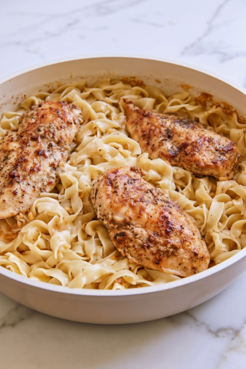 Easy One-Pan Buttery Chicken and Noodles 6 skillet filled with buttery chicken and noodles 2