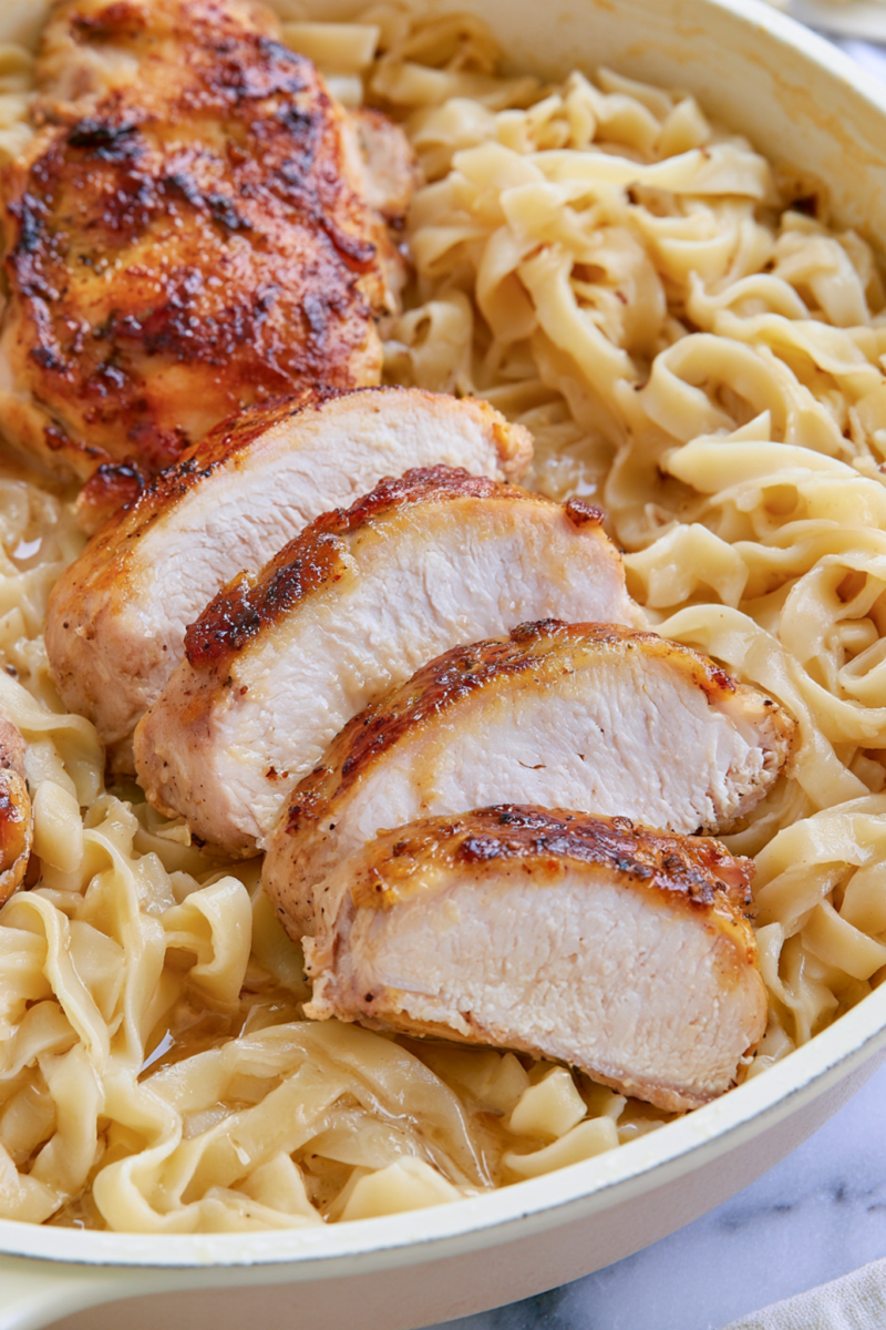 Easy One-Pan Buttery Chicken and Noodles 2 skillet filled with buttery chicken and noodles 3